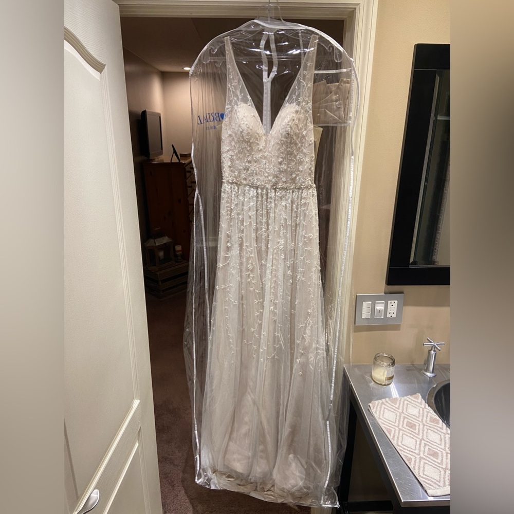 Mon Cheri wedding dress. In the bag with tags. Only tried on. No alterations